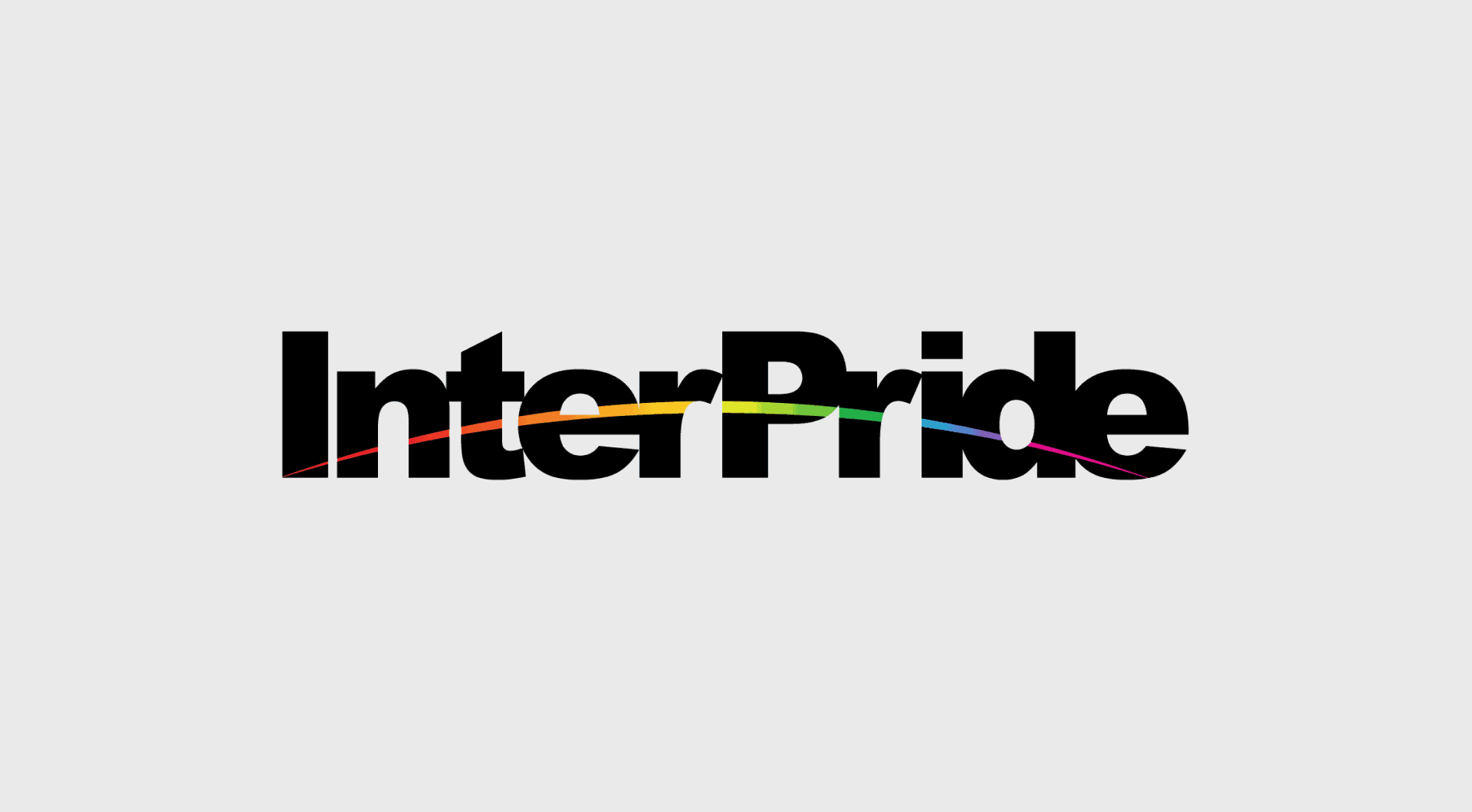 Black text with a rounded multicoloured line going through it reads 'InterPride' on a pale background