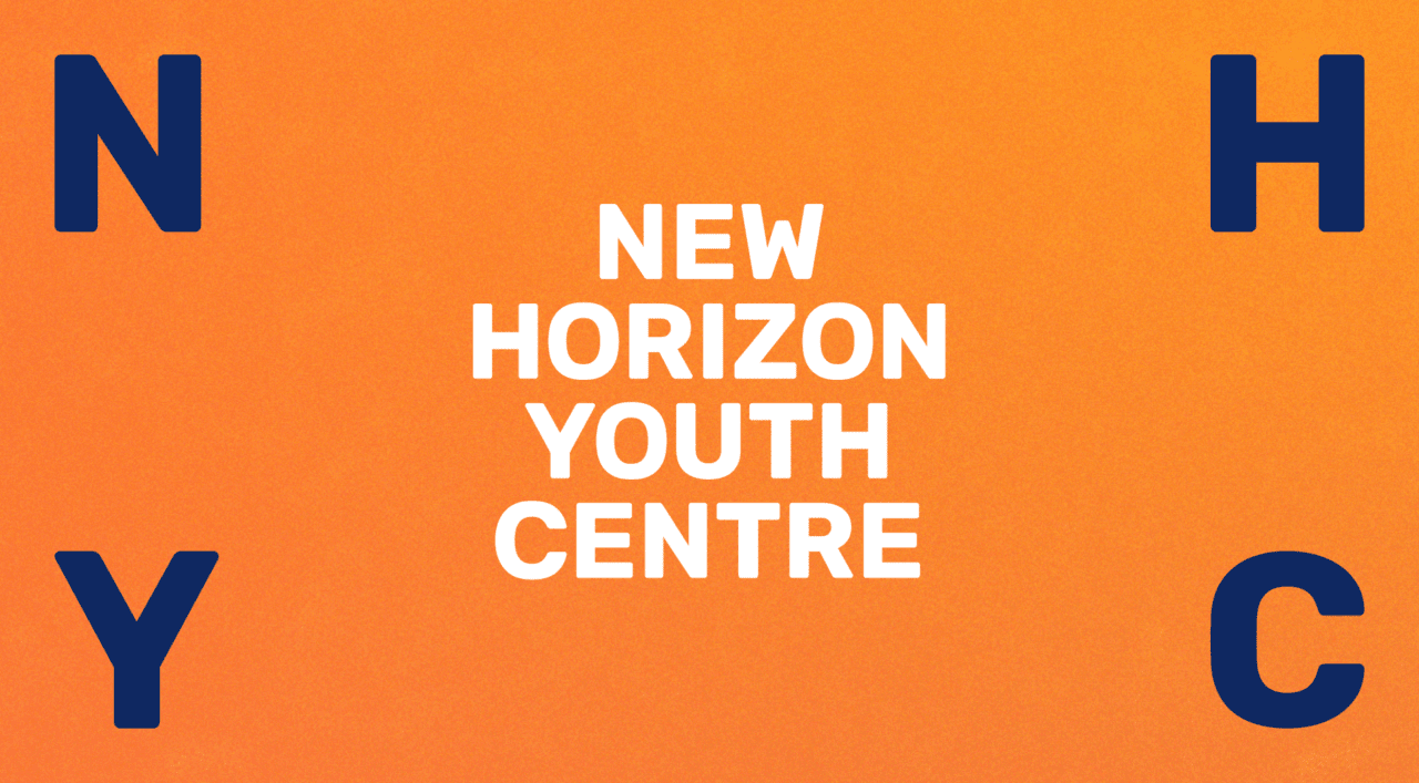 Centred white text reads 'New Horizon Youth Centre' on an orange background with navy blue letters N H Y C in the corners