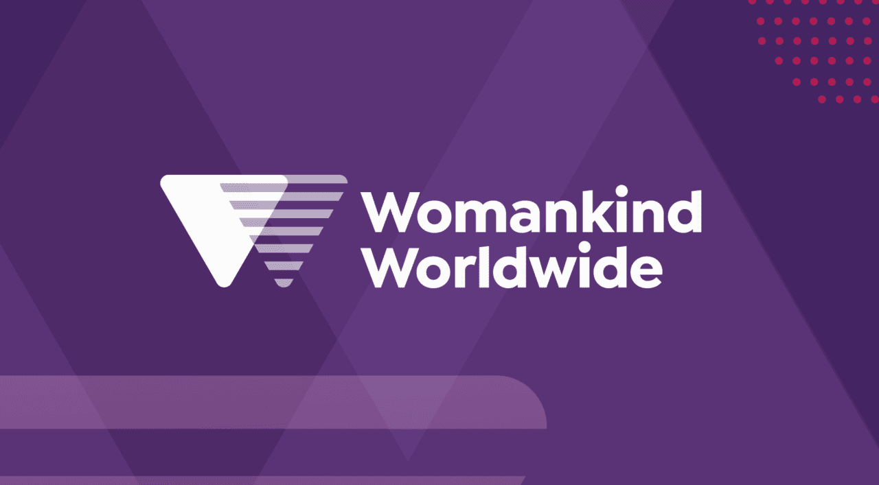 White text reading Womankind Worldwide on a purple background
